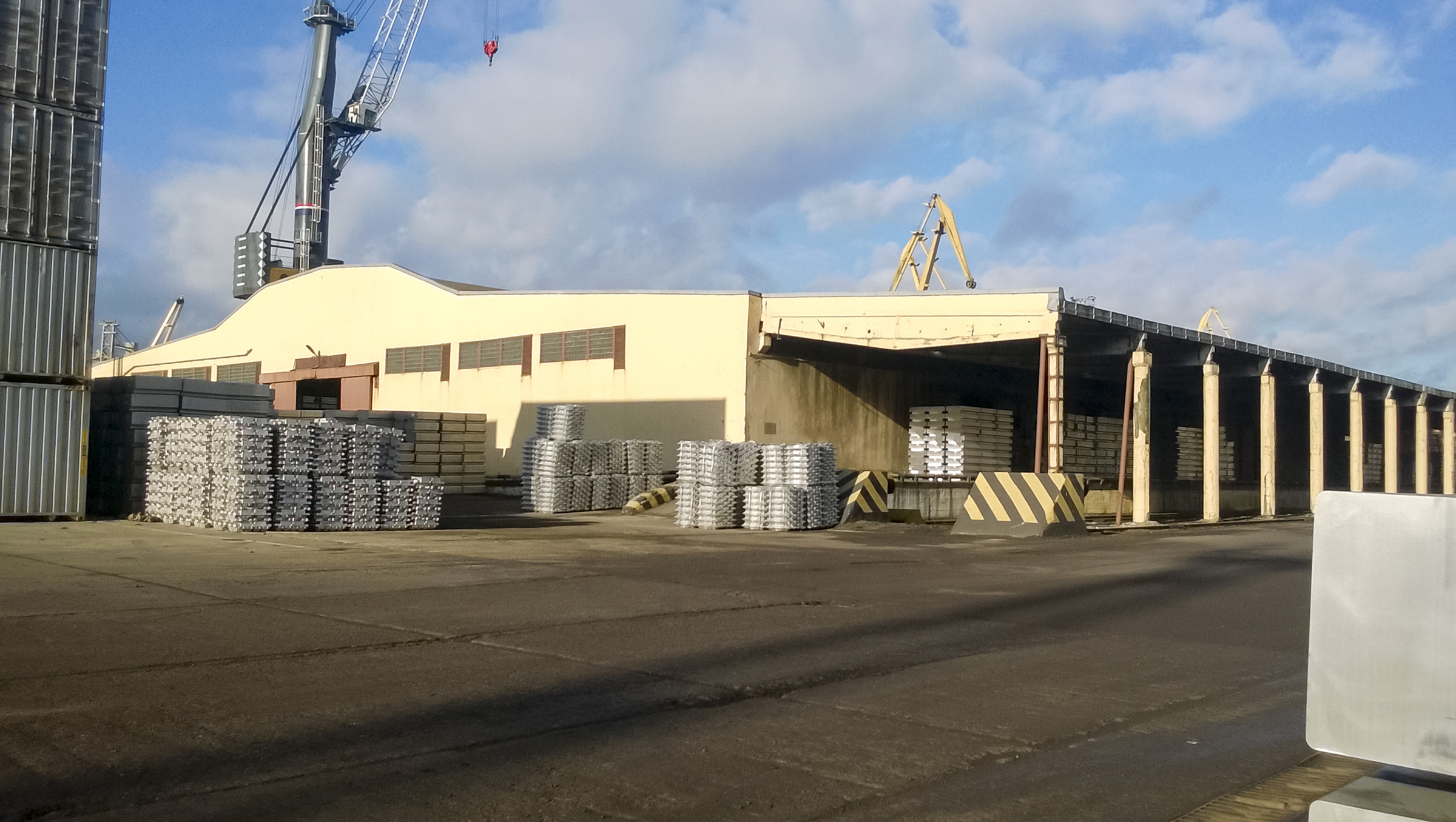 A port warehouse of aluminum ingots. Warehouse goods